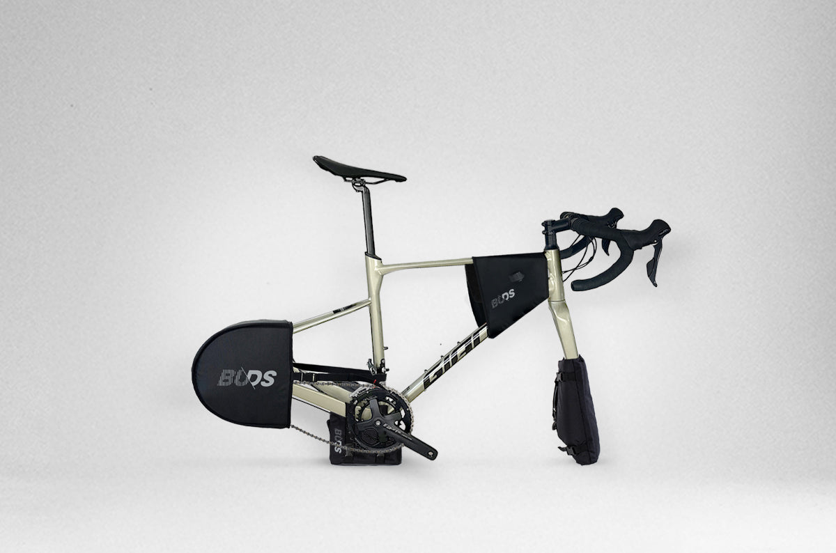 Rollbag Pro protection kit fitted on a road bike: fork, frame, drivetrain and rear derailleur protectors